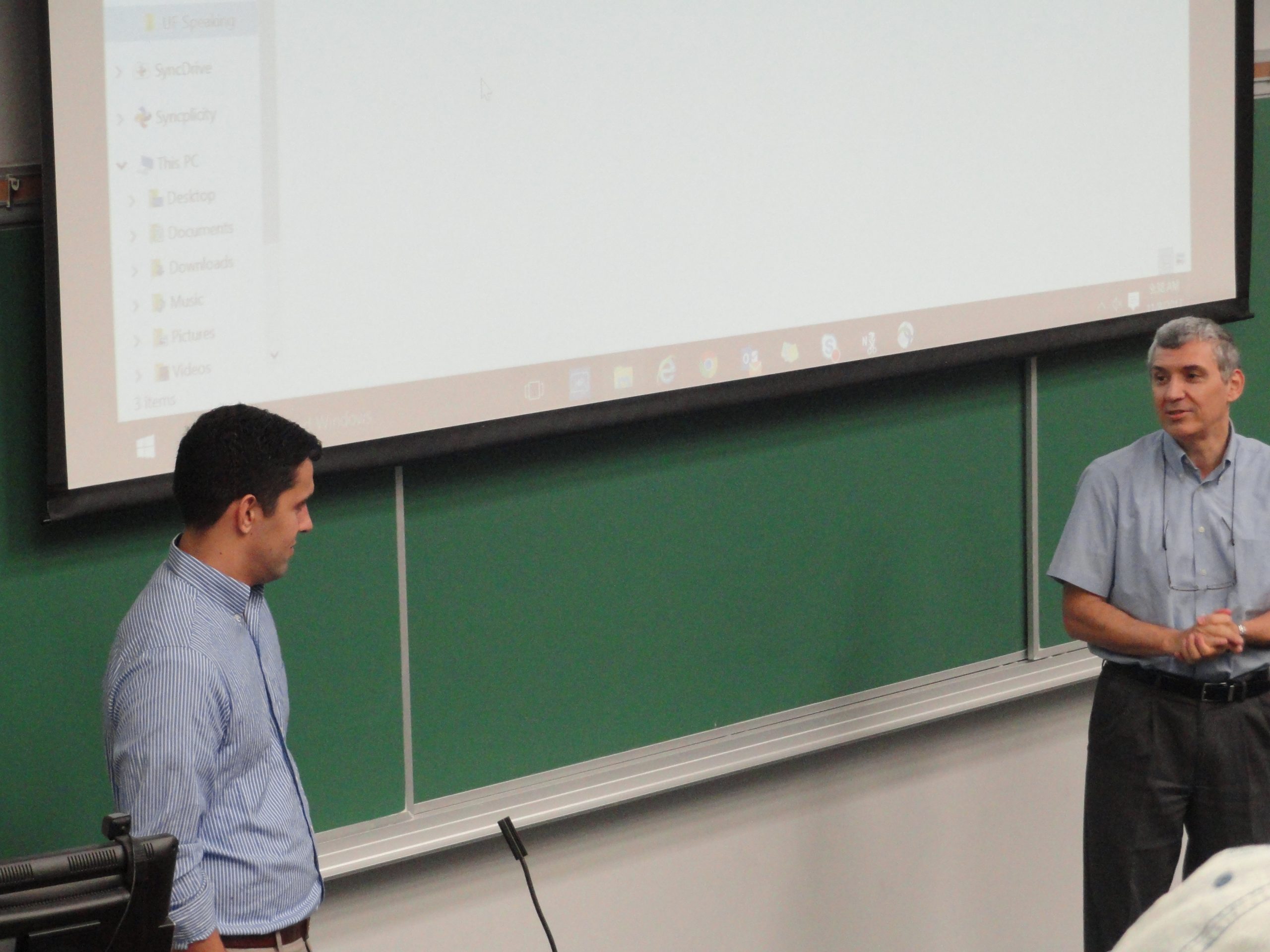 Ryan Strobel (Left) and Dr. Serdar Kirli (Right) deliver a presentation