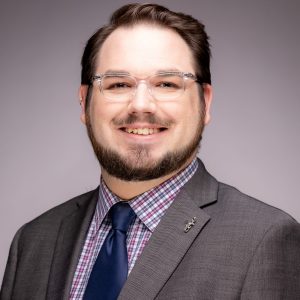 Faculty Member Jordan Sharpshair