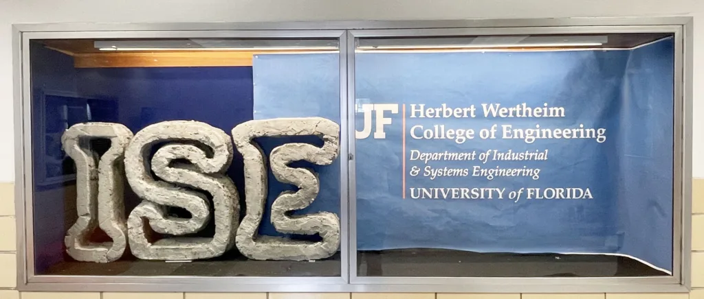 ISE concrete sign in a window display